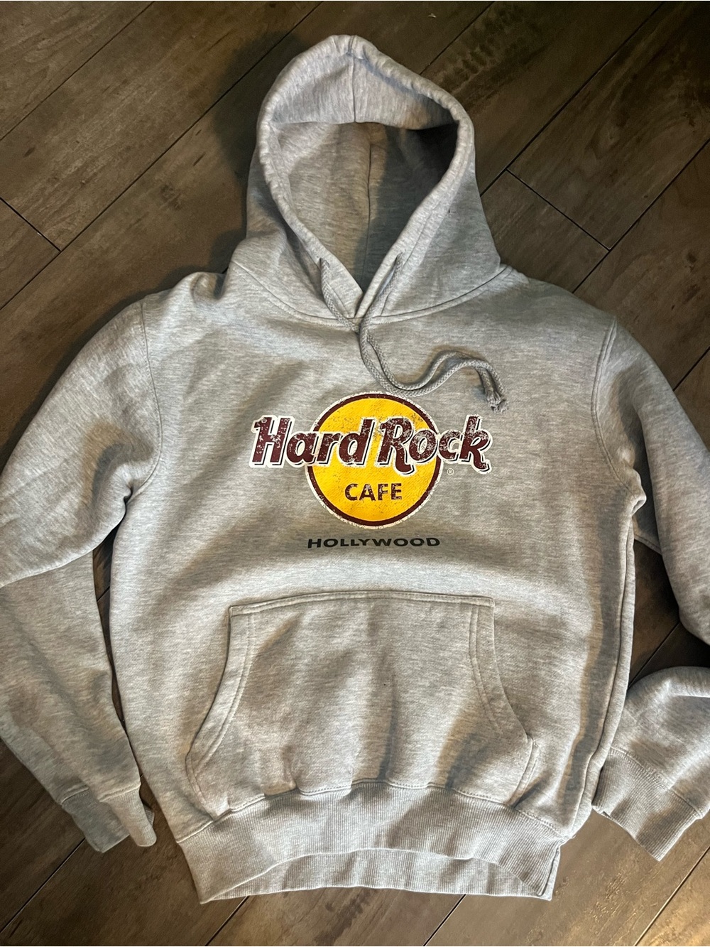 Hard Rock Cafe Grey Pullover with Yellow & Maroon Logo
Hollywood